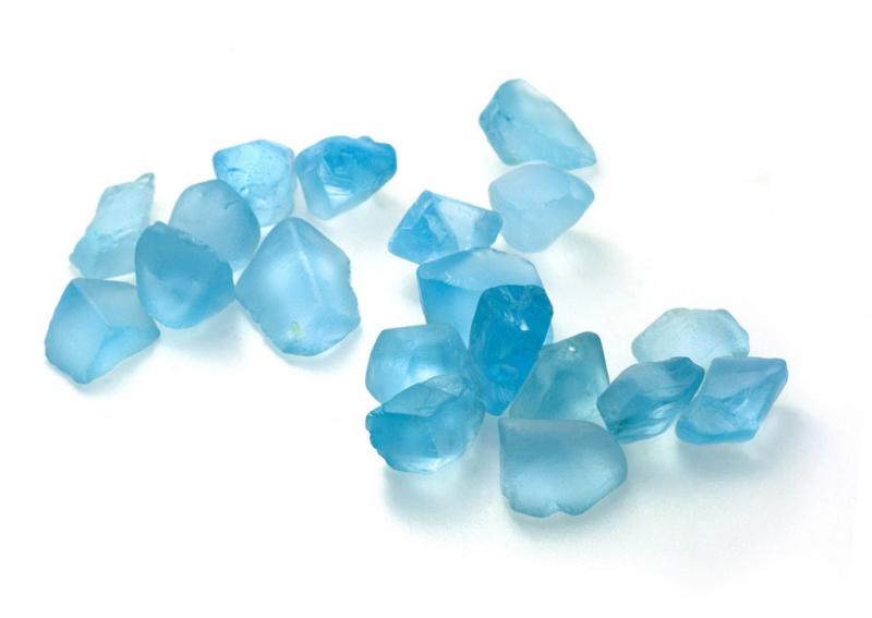 62f9bc39749daef1bd83dab0_Blue-topaz-rocks-isolated-on-white-background.jpg